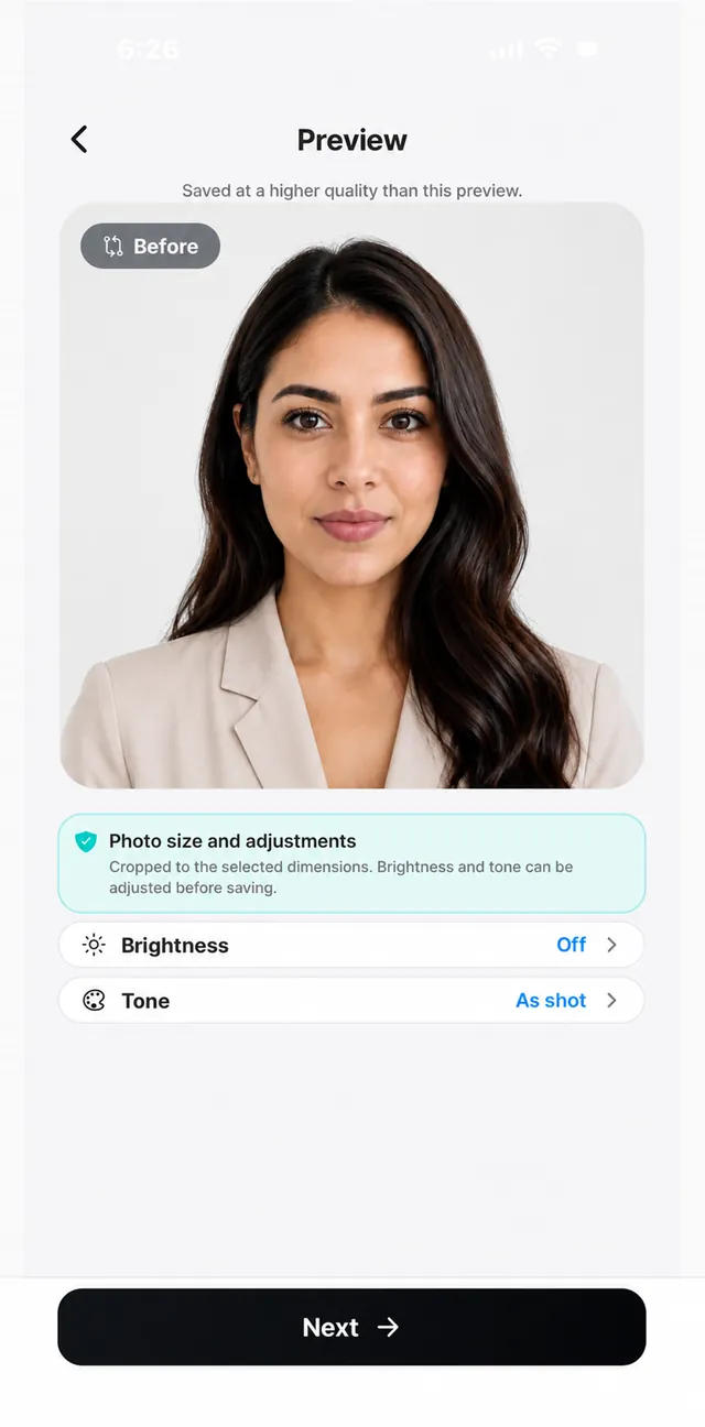 PhotoSpec preview screen — the cropped passport photo, with brightness and tone you can adjust before saving